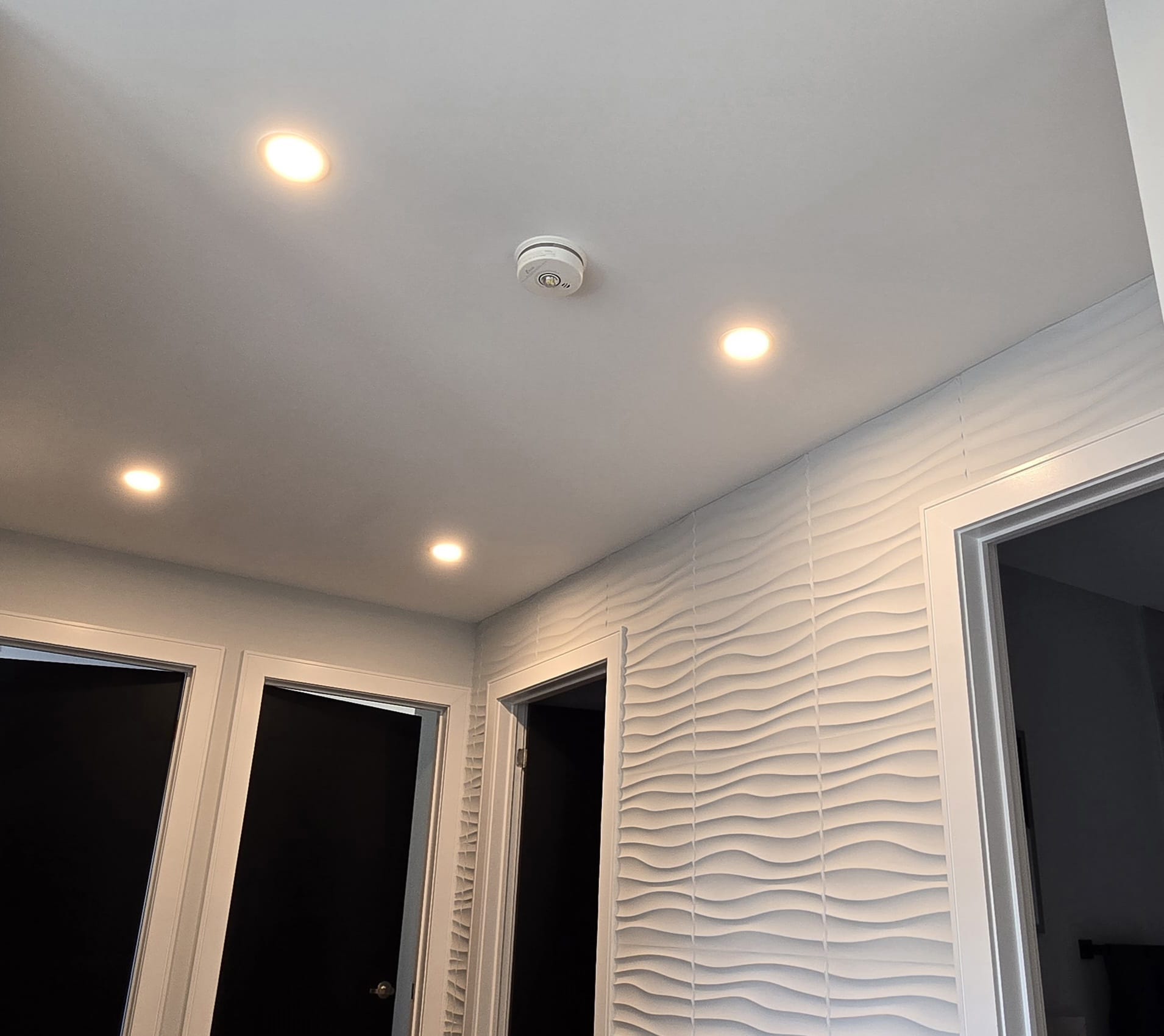 Recessed LED pot lights installed in a Toronto home by The HandyForce electrician